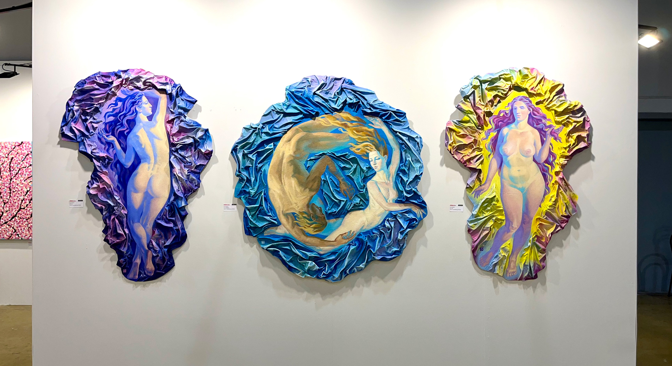 triptych of paintings sorrounded by waves, with moon, a lady from back in a purple aura and dusk with a lady in frontin lightening aura. at the sides and in the center the armony of love with 2 lovers in a blue circle