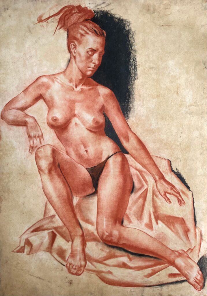 Nudo di giovane donna seduta