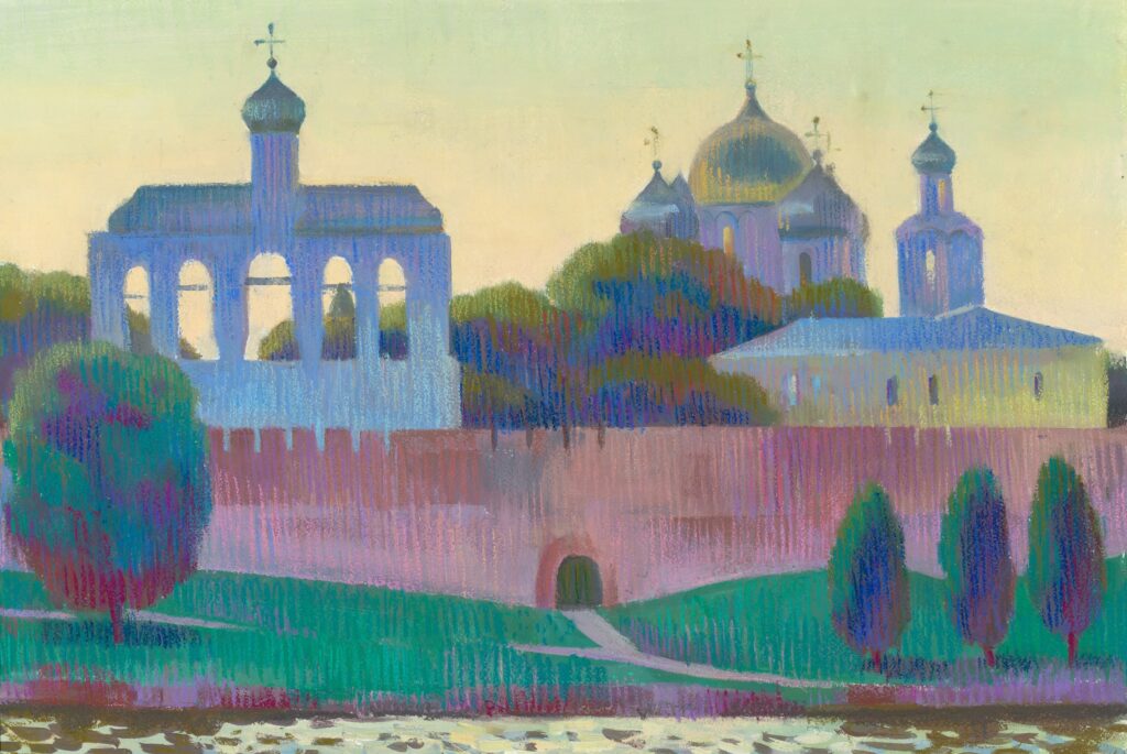 Kremlin and white Orthodox church at sunset