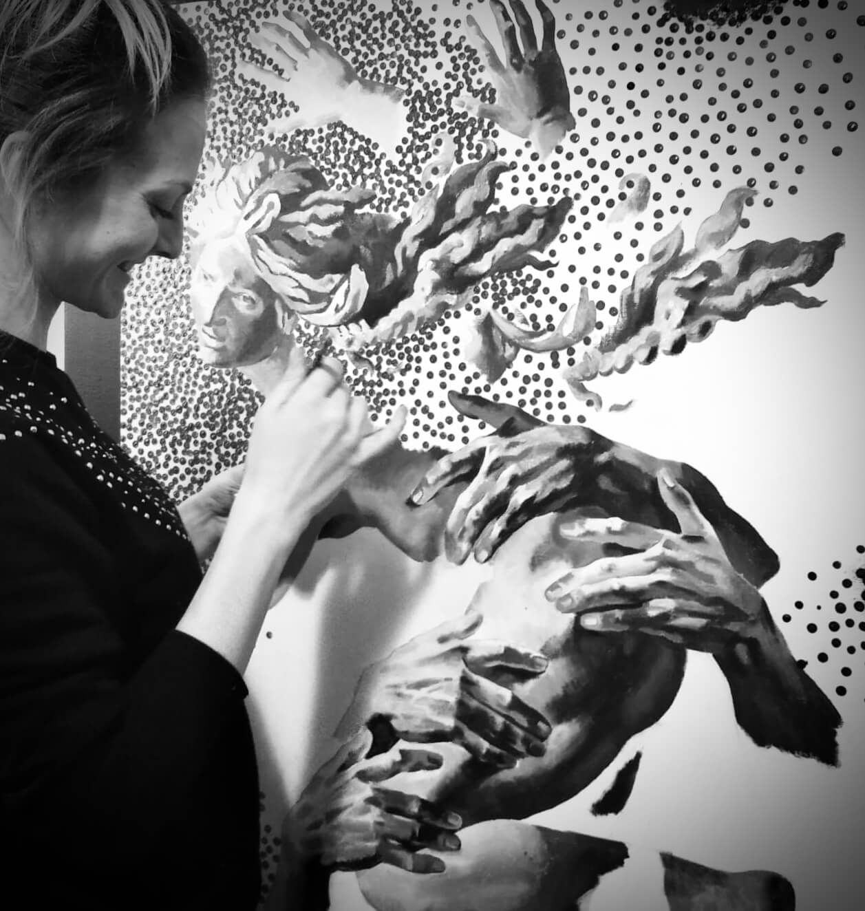 the artist is painting