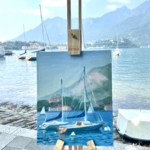 paint of a sail in the Lecco harbur in the day